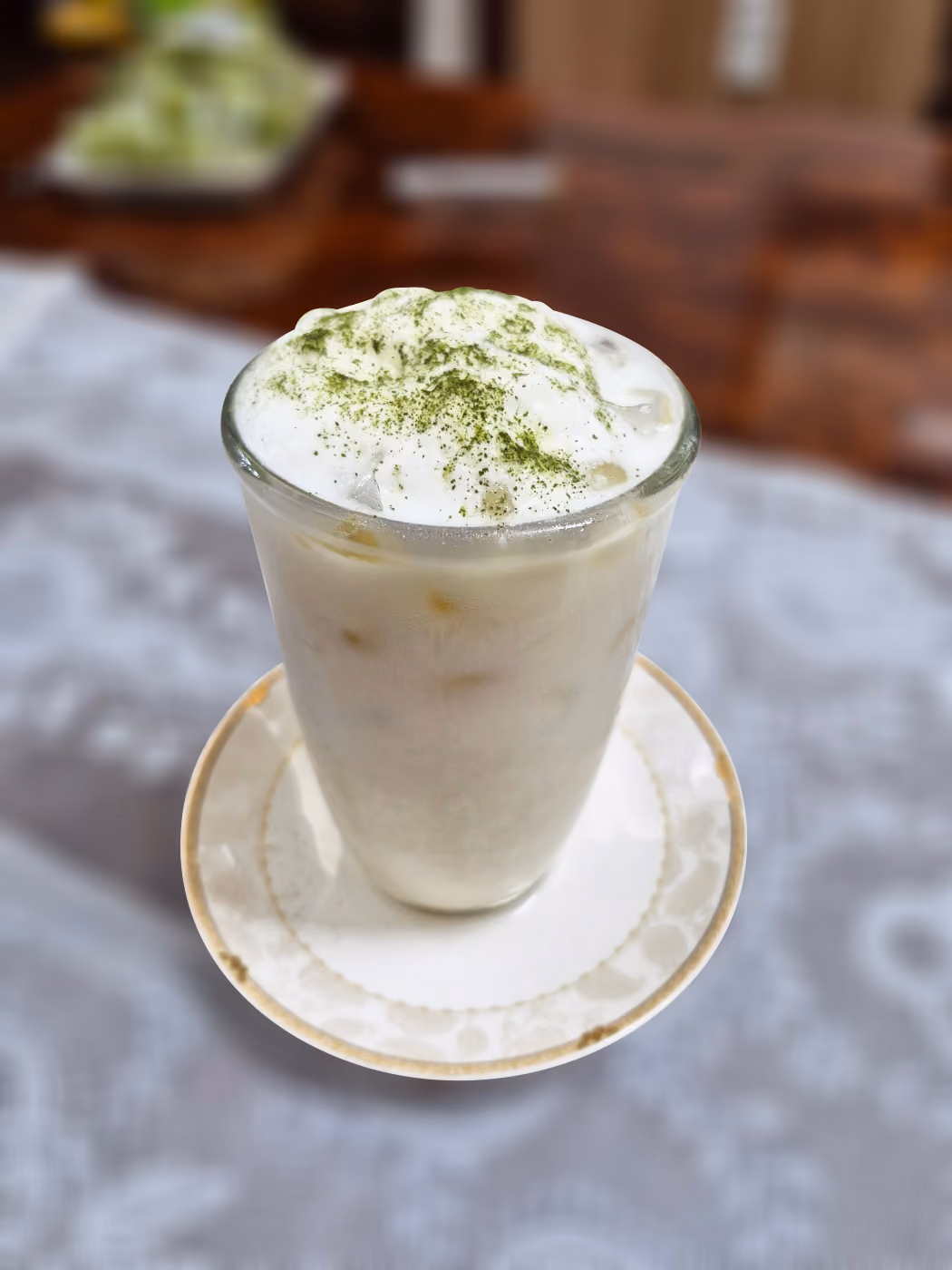 An iced ginseng latte in a glass
